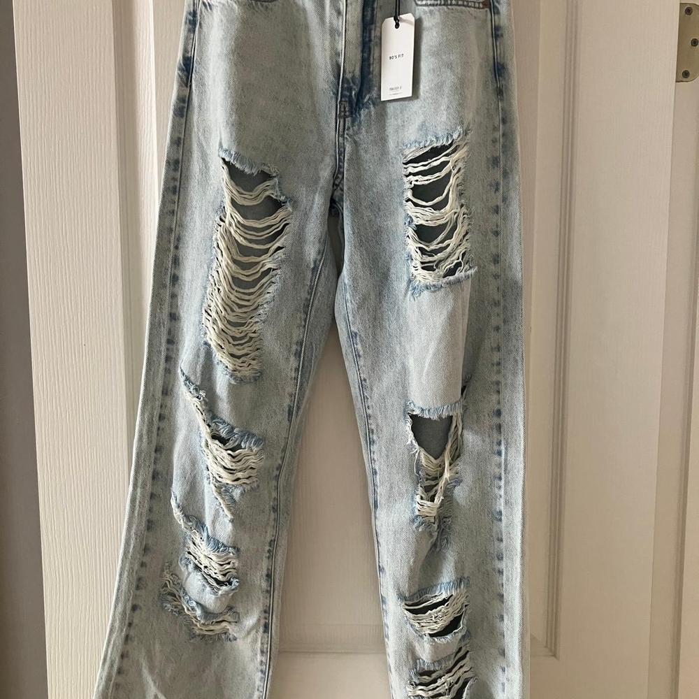 Distressed Light Blue Jeans